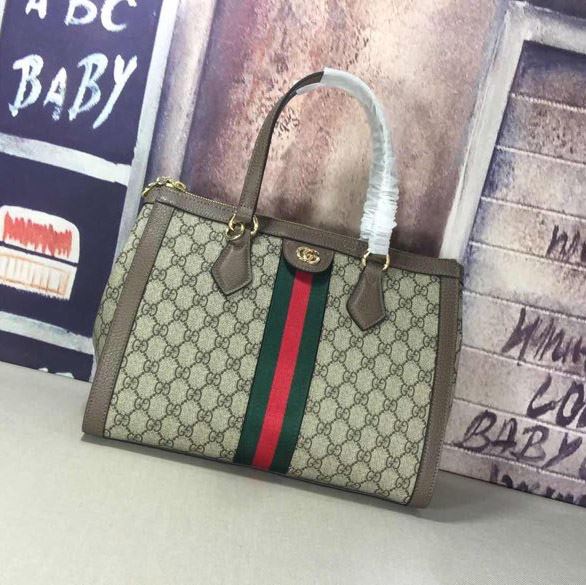 G*u*i top handle bags